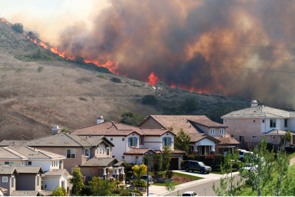 California homes threatened by wildfire indicate California's Home Insurance Crisis