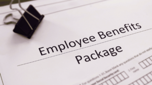 A packet of papers explaining an employee benefits package.
